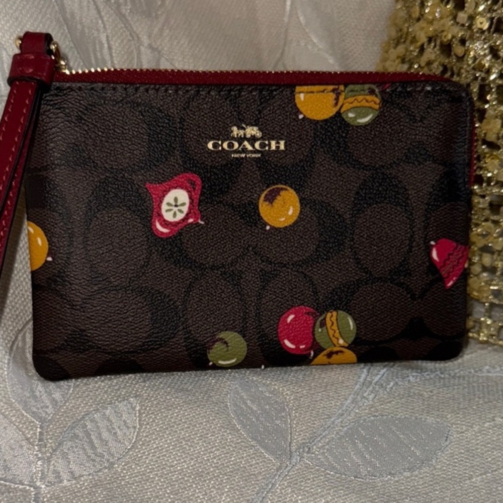 Coach NWOT Christmas Multicolor Wristlet with Red Strap